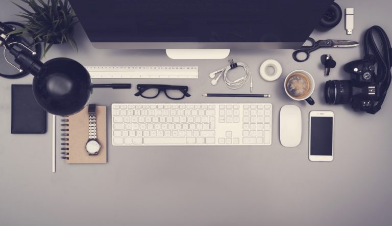 work desk with many items